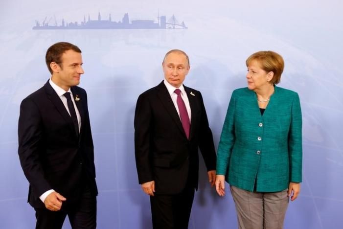 Макрон і Меркель разом із Путіним закликали припинити вогонь на Донбасі